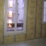 Isolation thermique intérieure d’un appartement avec pose de plaques de plâtre et travaux de peinture à Genève