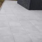 Pose de carrelage extérieur 60x60 gris anthracite à Saint-Genis-Pouilly